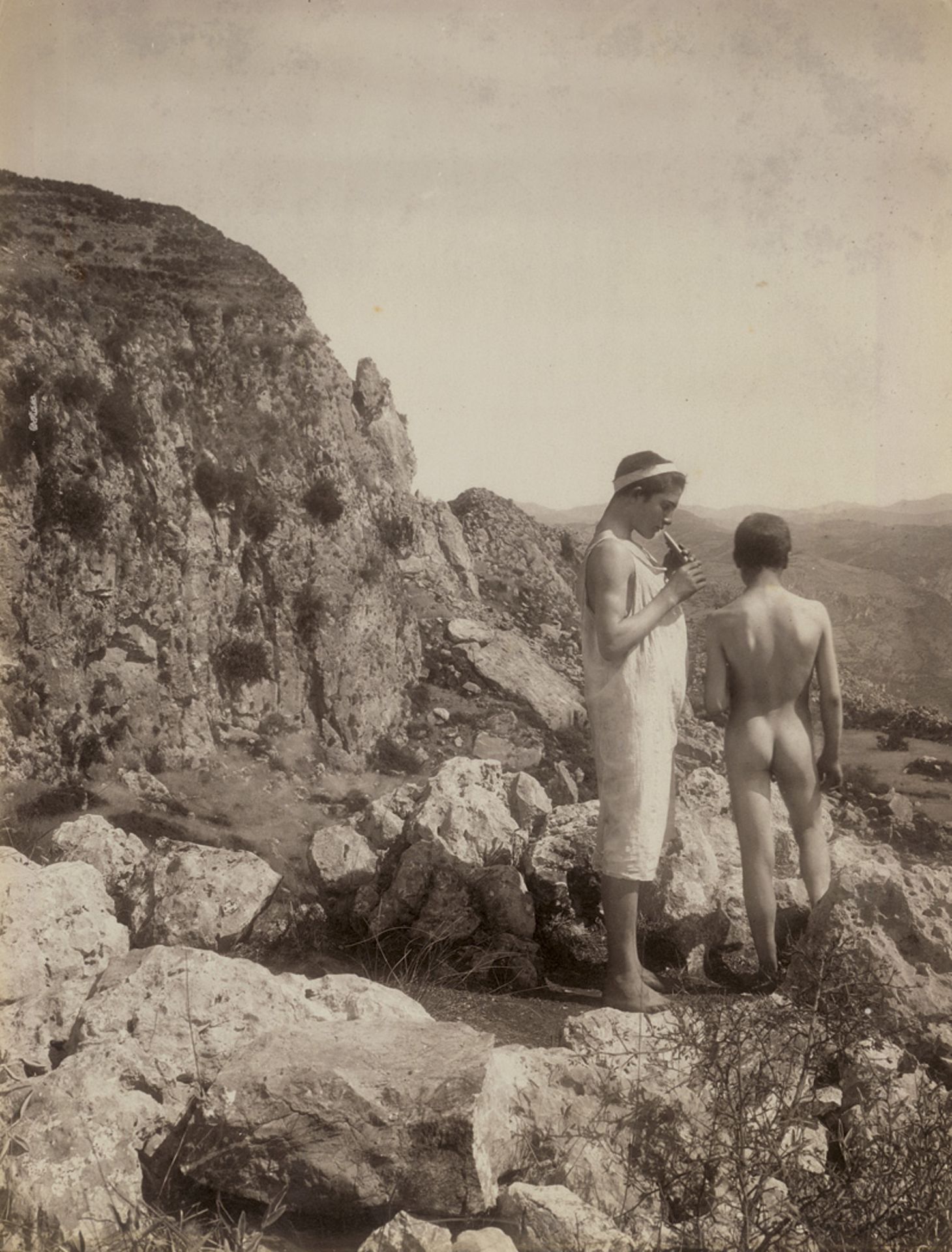 Gloeden, Wilhelm von: Young male nudes by fountain