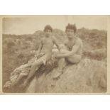 Gloeden, Wilhelm von: Two male nudes on rocks