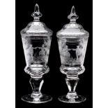 A pair of Bohemian engraved glass goblets and domed covers: in eighteenth century style,