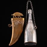 A novelty plated vesta case: modelled as a champagne bottle, 7cm high,