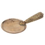 A 19th century Tibetan bronze ceremonial ladle: the shallow circular bowl with inscription to