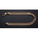 A 9ct gold flat curb-link bracelet on lobster clasp.