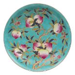 A Chinese famille rose peach dish: enamelled with branches of peaches,