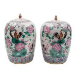 A pair of Chinese famille rose vases and covers for the Straits market: of oviform with lotus bud