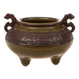 A Chinese tea-dust and imitation bronze glazed tripod censer: in archaistic style with dragon