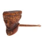 A small 19th Century carved wood pipe: the bowl in the form of a lady's head, 12cm long.