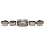 Two pairs of Burmese silver salts: of circular outline with foliate banded decoration, 5.