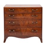 An early 19th Century mahogany and inlaid rectangular chest: the top with a chequer strung edge,