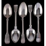 Five assorted Georgian and later Fiddle pattern table spoons, various makers and dates: initialled,