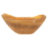 An Indo-Persian polished stoneware bowl: of oval outline, 27cm wide.