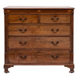 An early 19th Century mahogany and inlaid rectangular chest:, the top with a moulded edge,