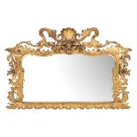 An early 19th Century carved giltwood landscape overmantel mirror:, with scallop shell,