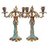 A pair of 19th Century French gilt-metal and opaque turquoise twin-branch candlesticks: with