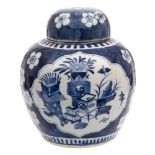 A Chinese blue and white ginger jar and cover: painted with two foliate panels of auspicious