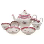 A New Hall part tea service: decorated with floral sprays and sprigs within magenta scale borders,