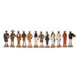 A collection of twenty four Indian plaster educational figures: including various officials,