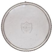 A George III silver salver, maker Elizabeth Jones, London, 1786: initialled, of circular outline,