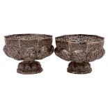 A pair of Indian silver bowls: of lobed polygonal form, with embossed decoration of figures,