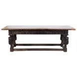 A 17th Century and later oak refectory table:, with an overhanging plank top,