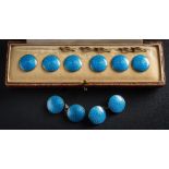 A pair of blue enamelled circular panel cuff-links with matching buttons, together with fitted case.