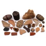 A collection of fossils and antiquarian pot sherds: including a woolly mammoth tooth, Samian wares,