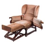 An Edwardian stained beech adjustable wing armchair:, fully upholstered in Dralon velvet fabric,