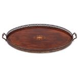 An Edwardian inlaid mahogany and sterling silver mounted galleried serving tray: of oval outline,