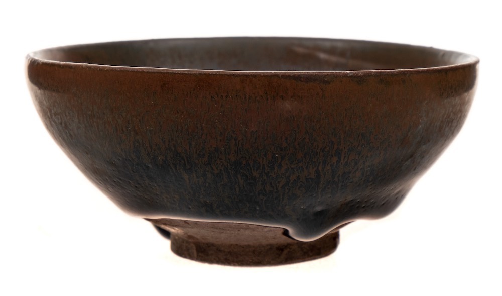 A Chinese Jian Ware 'Hares Fur' bowl:of circular form glazed with a deep brown and choclate brown