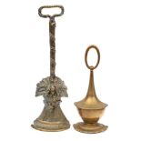 An early 19th Century brass door stop: in the form of a wheat-sheaf, 41cm high,