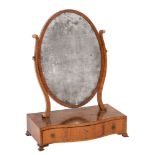 A George III mahogany and inlaid oval swing frame platform toilet mirror:,