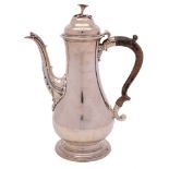 A George III silver coffee pot, maker WT possibly William Turton, London,