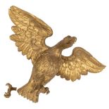 A carved giltwood figure of an eagle in the Regency style:,