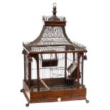 A Georgian mahogany and inlaid bird cage: of pagoda design,