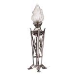An early 20th Century plated table lamp: the circular reservoir with opaque glass flame shade,