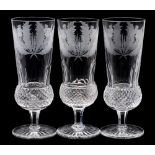 A set of twelve Edinburgh crystal flutes: of thistle shaped form with hob nail and slice cut bowls