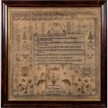 A Victorian needlework sampler: centred with religious verse, enclosed by alphabet, trees, flowers,