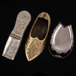 A novelty vesta case in the form of a horse's hoof: a white metal vesta/snuff case in the form of a