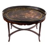 A 19th Century toleware tray: of oval outline with painted decoration of a Napoleonic naval