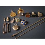 A 19th Century gold heart-shaped locket, four fob seals, a Russian five roubles gold coin,
