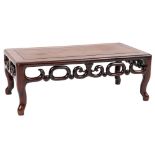 A Chinese Hua-Li wood rectangular urn table:, with a pierced scroll apron, on cabriole legs,