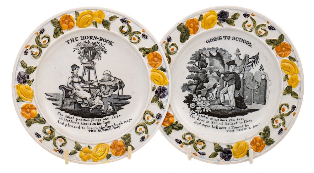 A pair of James and Ralph Clews pearlware plates: 'The Horn-Book' and 'Going To School' printed in