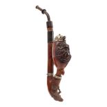 A late 19th/early 20th Century German carved briar pipe: the bowl decorated with a stag and doe,