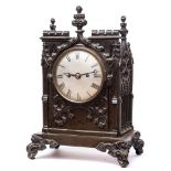A Victorian bronze Gothic bracket clock: the eight-day duration,