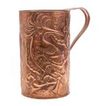 An Arts & Craft embossed copper mug: decorated with crested birds, crown, sun and Greek letters,