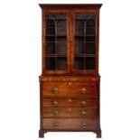 A Regency Scottish mahogany and inlaid secretaire chest with associated bookcase:,
