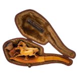 A late 19th century carved Meerschaum pipe: decorated with two prancing horses,
