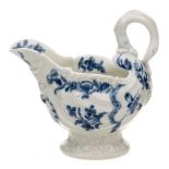 A First Period Worcester dolphin ewer creamboat: of rococo shell moulded form with lamprey handle,