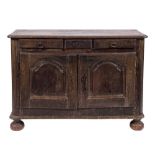 A 19th Century French provincial oak dresser base:, with a moulded top,