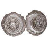 A pair of Continental silver dishes, stamped 900: of circular outline with wavy edge border,