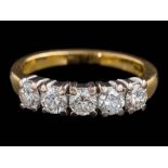 An 18ct gold and diamond five-stone ring: set with round,